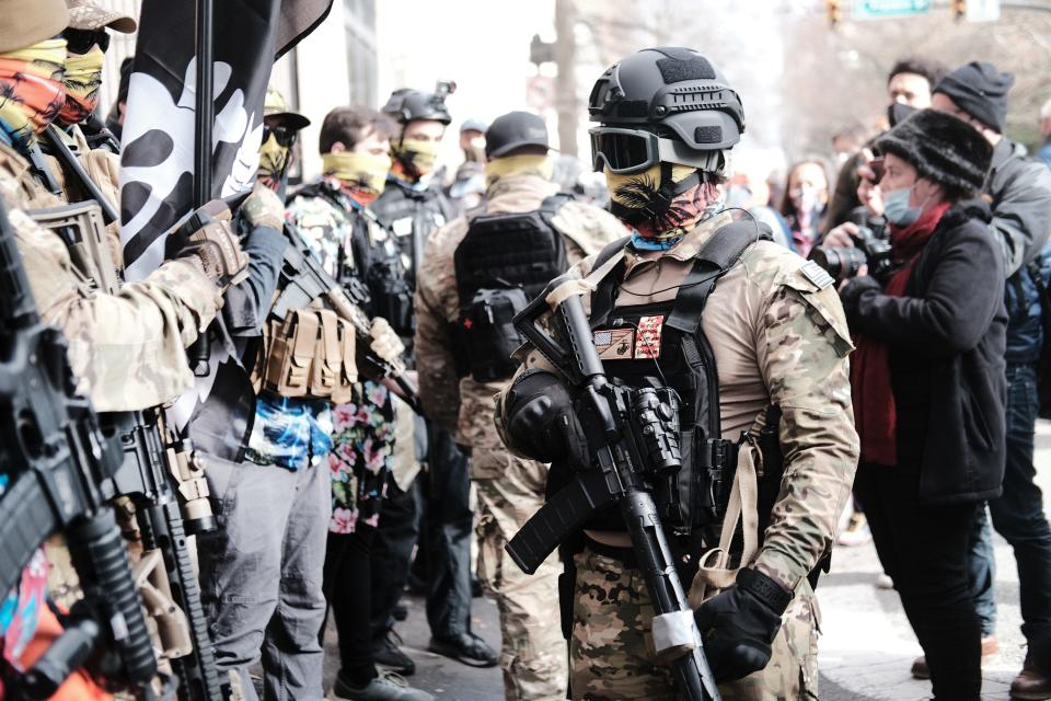 Members of the Boogaloo Bois join other gun rights advocates in front of the State House as pro-gun supporters gather on Jan. 18, 2021 in Richmond, Virginia.