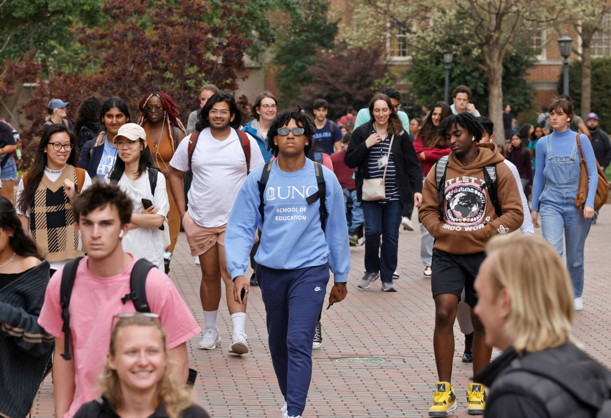 University of North Carolina students make their way across the campus in Chapel Hill on March 28, 2023. (Jonathan Drake / Reuters / Redux)
