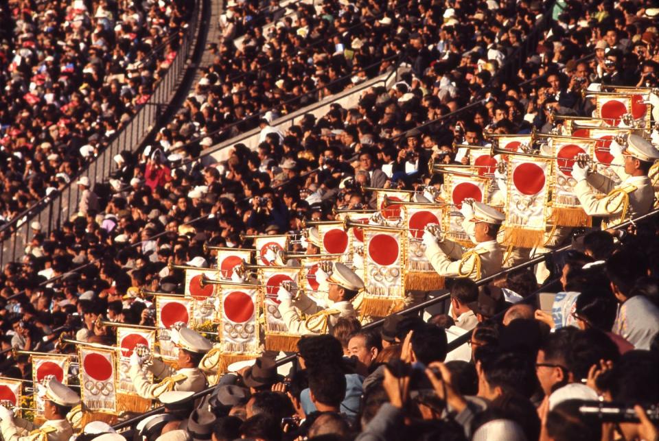 <p>Japan opted to incorporate the crowd into their opening ceremony fanfare. While hosting the 1964 Summer Olympic Games, the nation placed a group of trumpeters in the stands. </p>