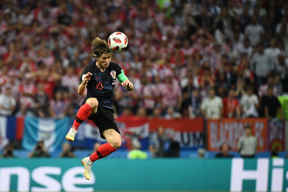 <p>Croatia’s midfielder Luka Modric heads the ball during the Russia 2018 World Cup semi-final football match between Croatia and England at the Luzhniki Stadium in Moscow on July 11, 2018. (Photo by FRANCK FIFE / AFP) </p>