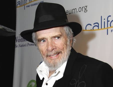 Country music performer Merle Haggard walks the red carpet at the California Hall of Fame Induction Ceremony at the California Museum in Sacramento, California, in this file photo taken December 14, 2010. REUTERS/Kevin Bartram/Files
