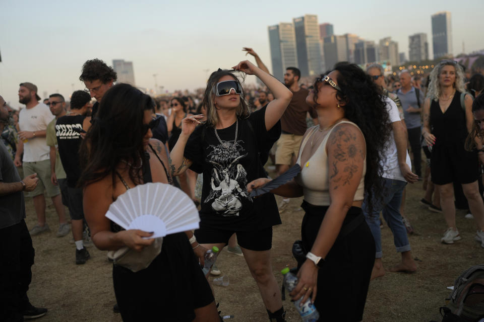 People dance the Nova Healing Concert in Tel Aviv, Israel, on Thursday, June 27, 2024. This was the first Tribe of Nova mass gathering since the Oct. 7, 2023 cross-border attack by Hamas that left hundreds at the Nova music festival dead or kidnapped to Gaza. (AP Photo/Ohad Zwigenberg)