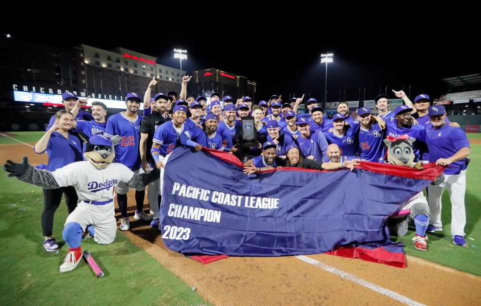 The Oklahoma City Dodgers celebrate after the PCL Championship Series baseball game between the Oklahoma City Dodgers and the Round Rock Express at the Chickasaw Bricktown Ballpark in Oklahoma City, Wednesday, Sept. 27, 2023. The Dodgers won 5-2.