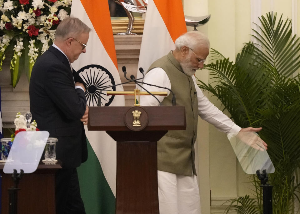 Indian Prime Minister Narendra Modi and his Australian counterpart Anthony Albanese leave after exchange of agreements and press statement, in New Delhi, India, Friday, March 10, 2023. (AP Photo/Manish Swarup)