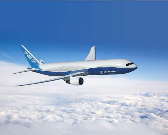 A rendering of a Boeing 767 flying over clouds