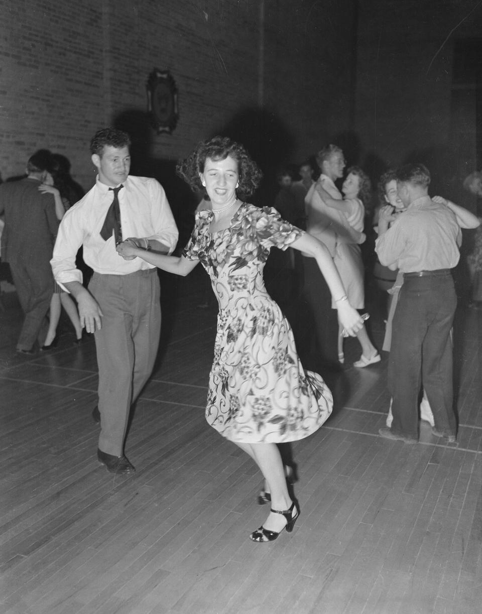 <p>A young couple dances at a Fourth of July celebration in Price, Utah, 1946. (Photo: Smith Collection/Gado/Getty Images) </p>