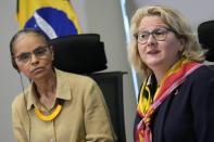 Germany's Economic Cooperation and Development Minister Svenja Schulze, right, gives a statement to the press alongside Brazil's Environment Minister Marina Silva, left, in Brasilia, Brazil, Monday, Jan. 30, 2023. (AP Photo/Eraldo Peres)