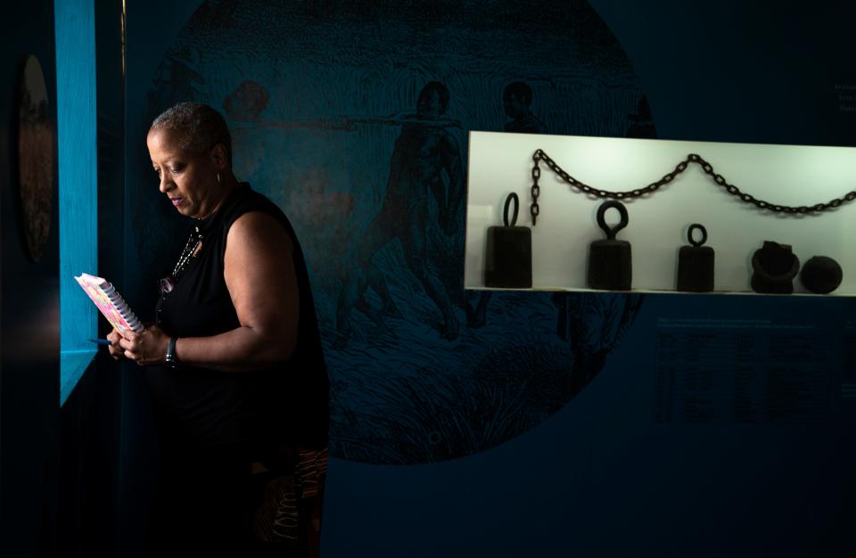 Wanda Tucker takes a moment to reflect at the National Museum of Slavery in Morro Da Crus on Sunday, July 28, 2019.