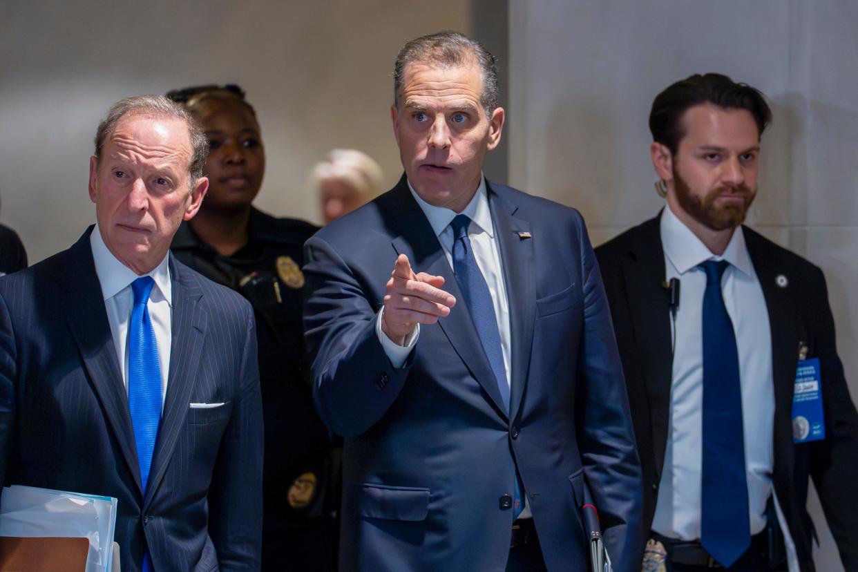 Hunter Biden, son of President Joe Biden, with attorney Abbe Lowell, left, leaves after a closed-door deposition in the Republican-led investigation into the Biden family, on Capitol Hill in Washington, Wednesday, Feb. 28, 2024.