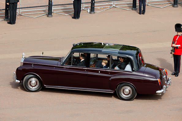 LONDON, ENGLAND - SEPTEMBER 19: Prince George of Wales, Princess Charlotte of Wales and Catherine, Princess of Wales are driven in car along the Mall after the State Funeral of Queen Elizabeth II on September 19, 2022 in London, England. Elizabeth Alexandra Mary Windsor was born in Bruton Street, Mayfair, London on 21 April 1926. She married Prince Philip in 1947 and ascended the throne of the United Kingdom and Commonwealth on 6 February 1952 after the death of her Father, King George VI. Queen Elizabeth II died at Balmoral Castle in Scotland on September 8, 2022, and is succeeded by her eldest son, King Charles III.  (Photo by Chip Somodevilla/Getty Images)