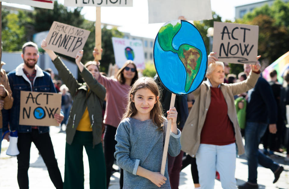 People with placards and posters during a strike against the global threat of climate change.