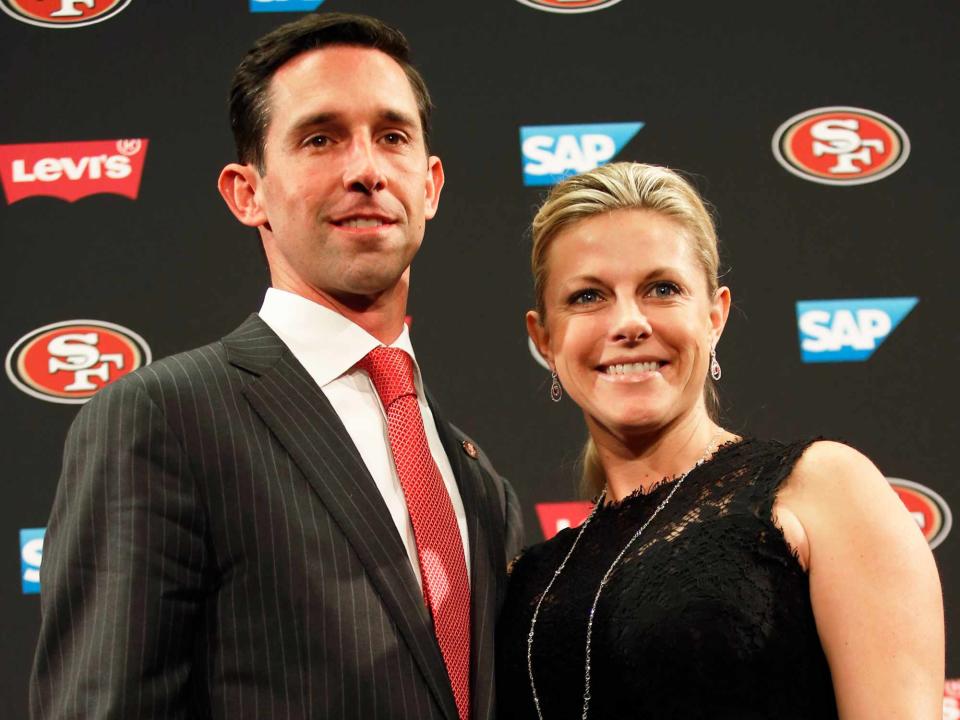 <p>Michael Zagaris/San Francisco 49ers/Getty</p> Kyle Shanahan and Mandy Shanahan during a press conference at Levi Stadium on February 9, 2017 in Santa Clara, California.