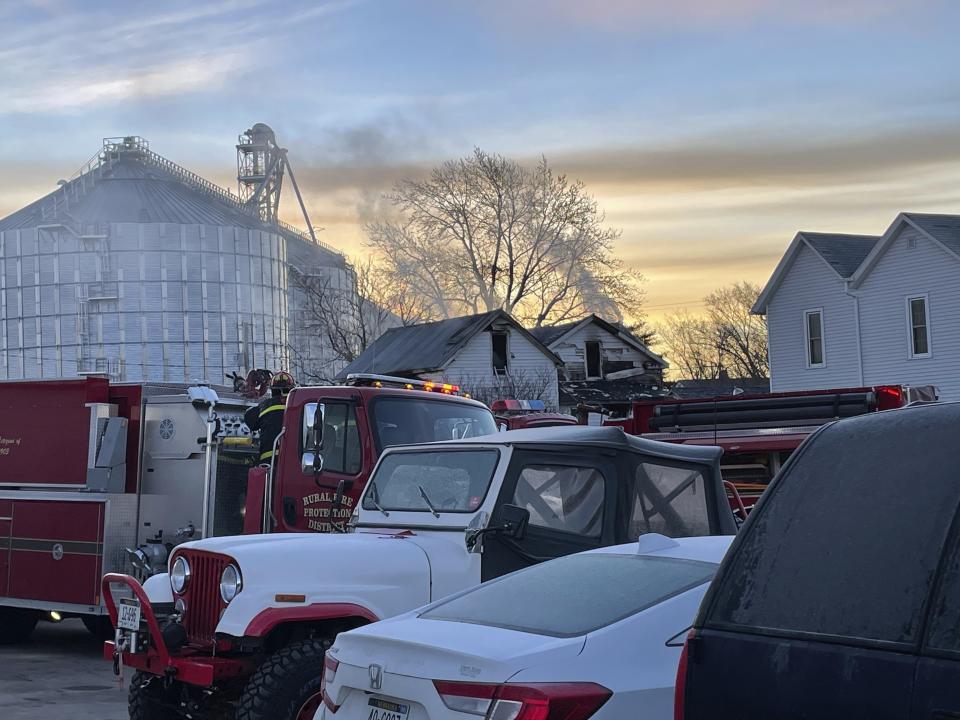 Multiple area fire departments assist Pierce Fire & Rescue at the scene of a house fire in Pierce, Neb., early Saturday morning, Jan. 29, 2022. Three children died after the home caught fire in a rural area of northern Nebraska. (Kathryn Harris/The Norfolk Daily News via AP)