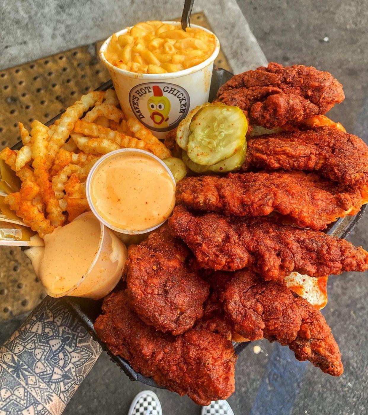 Dave's Hot Chicken will open its first Visalia location on Friday, March 24, 2023, bringing customers its simple menu of hot chicken tenders, slicers, fries, kale slaw and mac and cheese.