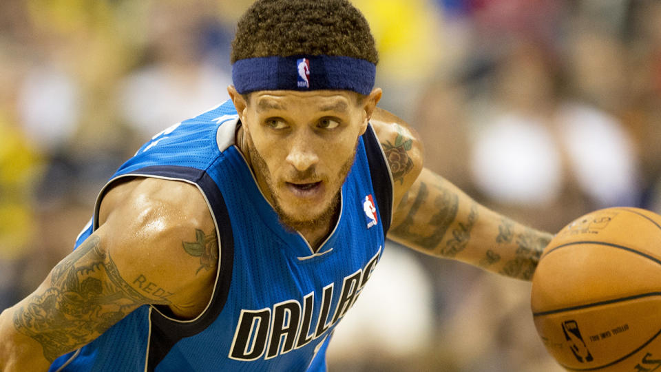 Delonte West is pictured playing in the NBA for the Dallas Mavericks.