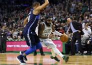 Dec 6, 2017; Boston, MA, USA; Boston Celtics guard Kyrie Irving (11) drives against Dallas Mavericks guard Devin Harris (34) during the fourth quarter of a 97-90 Boston victory at TD Garden. Mandatory Credit: Winslow Townson-USA TODAY Sports