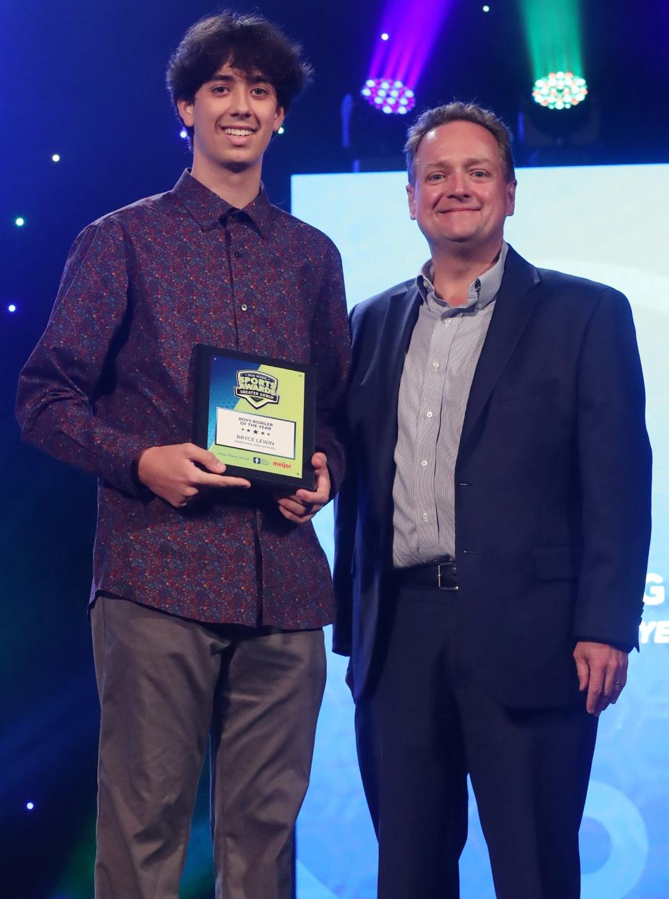 Nordonia High's Bryce Lewin Greater Akron Boys Bowling Player of the Year with Michael Shearer Akron Beacon Journal editor at the High School Sports All-Star Awards at the Civic Theatre in Akron on Friday.