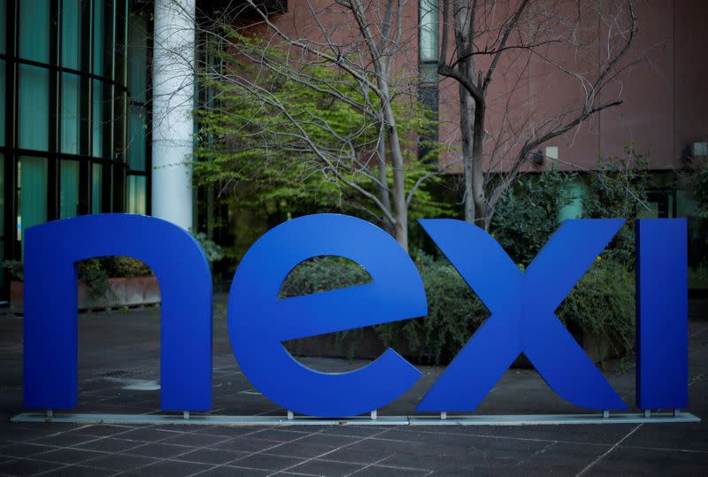 FILE PHOTO: The logo of Italian payments group Nexi is pictured outside their headquarters in Milan