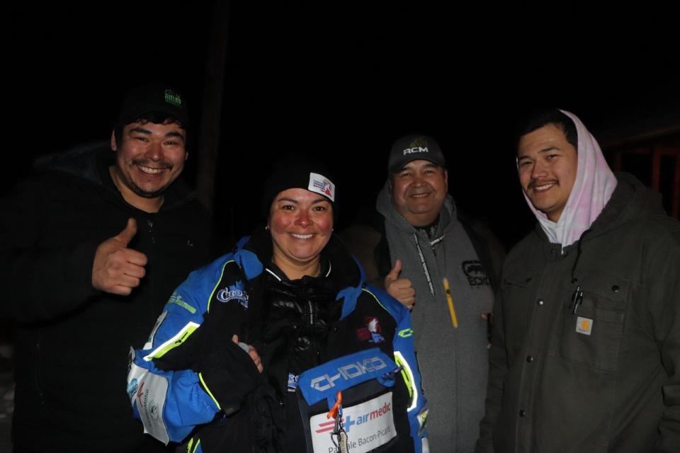 Pascale Bacon-Picard, one of the expedition's participants, was welcomed at the finish line by her family.  