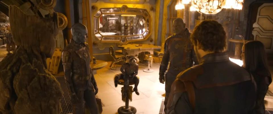 The Guardians all stand around in a circle with Rocket sitting on Knowhere  in Guardians of the Galaxy Vol. 3