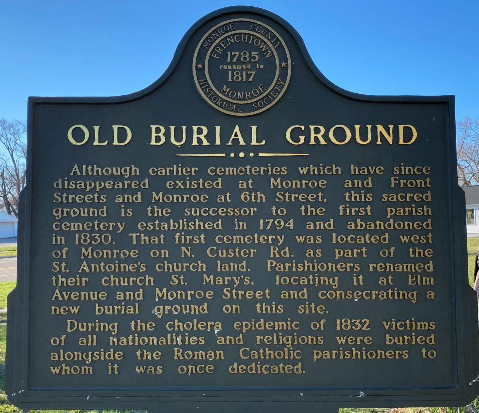 This photo of the St. Antoine Burial Ground Marker located off N. Monroe St. provides a historical overview of Catholic burial history in Monroe.