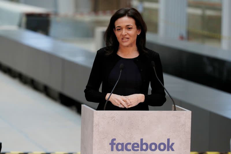 FILE PHOTO: Sheryl Sandberg, chief operating officer of Facebook, delivers a speech during a visit in Paris