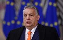 Hungary's Prime Minister Viktor Orban arrives for an EU summit at the European Council building in Brussels, Thursday, Dec. 10, 2020. European Union leaders meet for a year-end summit that will address anything from climate, sanctions against Turkey to budget and virus recovery plans. Brexit will be discussed on the sidelines. (John Thys, Pool via AP)