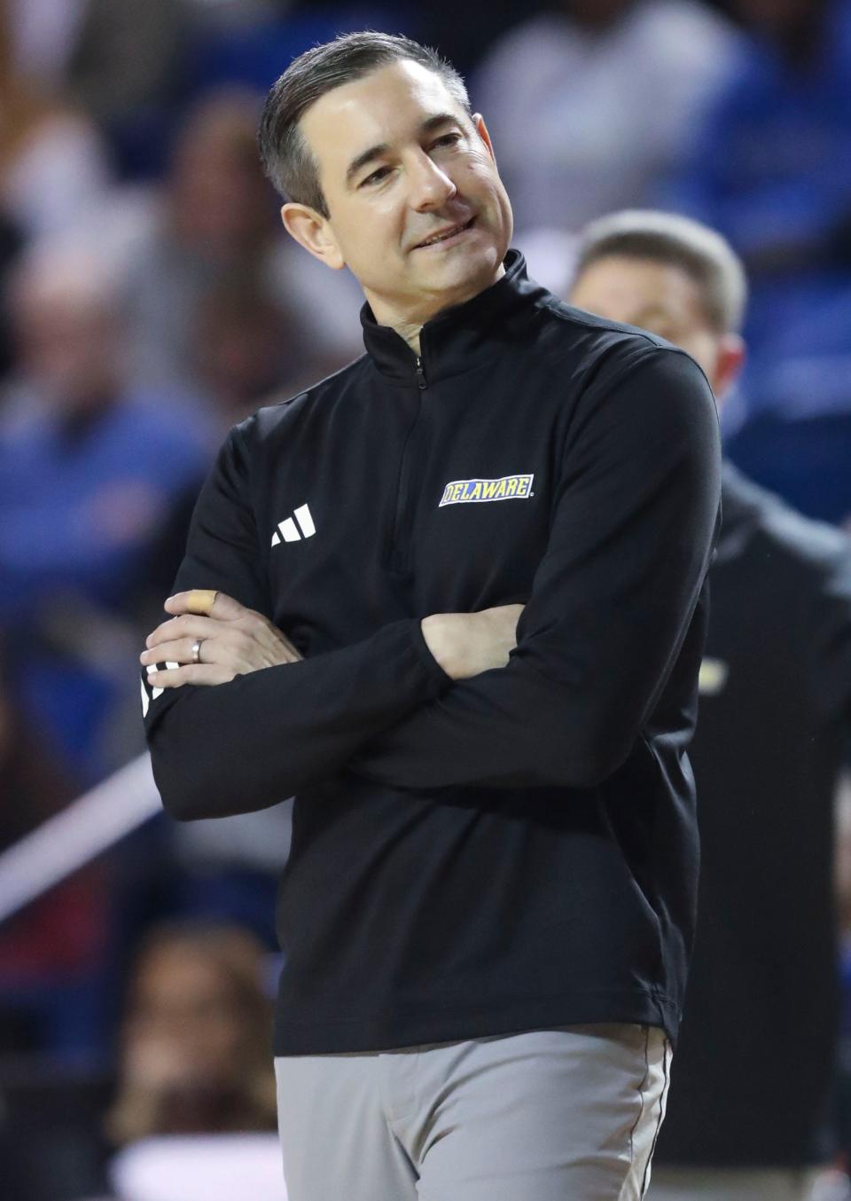 Delaware head coach Martin Ingelsby goes into a late timeout with his team down double digits in the second half of Delaware's 90-71 loss to Charleston at the Bob Carpenter Center, Thursday, Feb. 22, 2024.