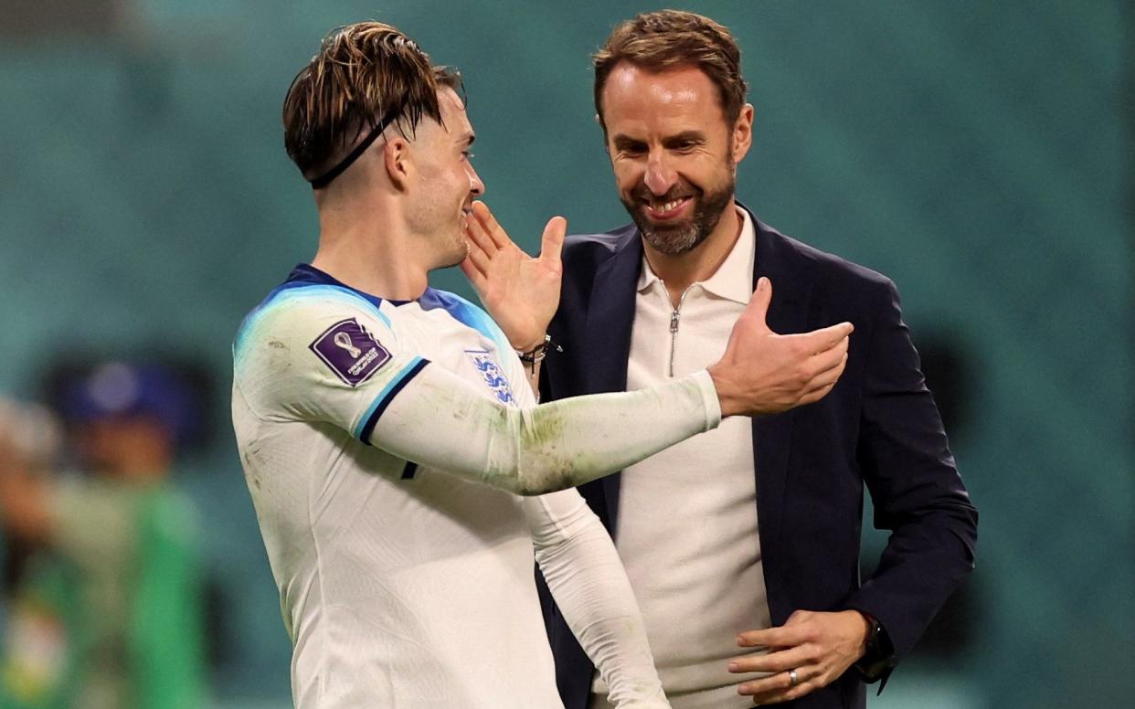 Jack Grealish and Gareth Southgate - World Cup prize money will see England players receive £400,000 each if they win final - Carl Recine/Reuters