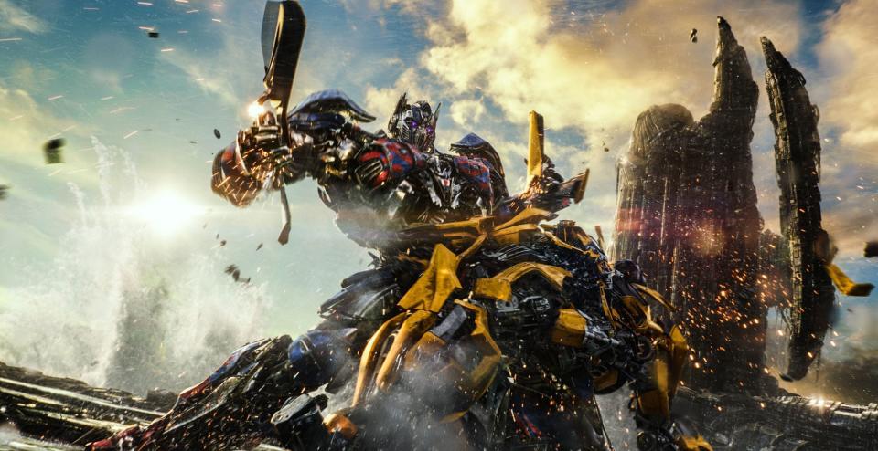 Autobot pals Optimus Prime and Bumblebee tussle in "Transformers: The Last Knight."