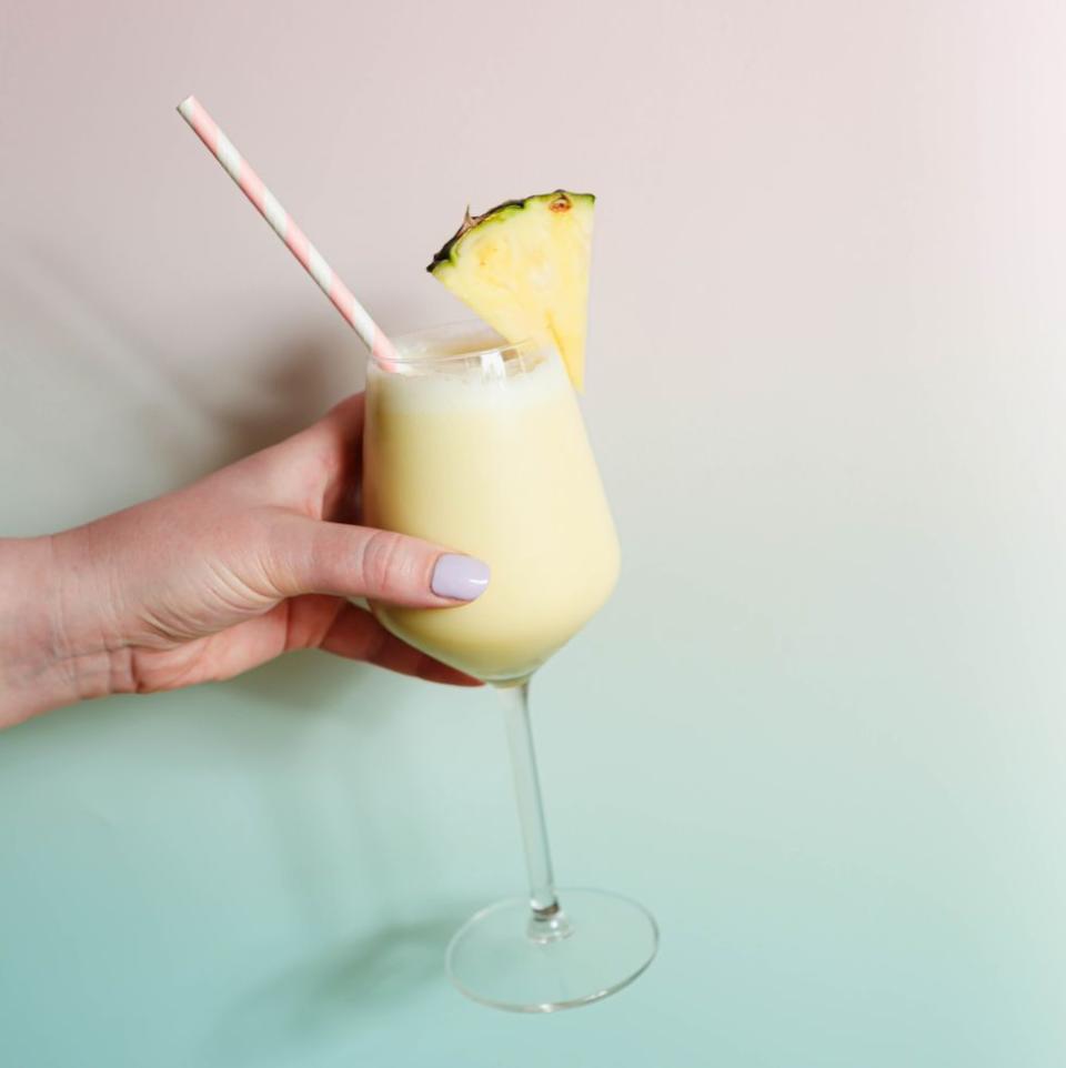 <p>The epitome of sunshine and white sandy beaches, the Piña Colada can transport you straight to the beautiful shores of Puerto Rico in no time at all. This sweet cocktail is made using <a href="https://www.delish.com/uk/cooking/recipes/a30167088/rum-ball-recipe/" rel="nofollow noopener" target="_blank" data-ylk="slk:rum;elm:context_link;itc:0" class="link ">rum</a>, coconut cream or milk and <a href="https://www.delish.com/uk/food-news/a28890023/how-to-cut-a-pineapple/" rel="nofollow noopener" target="_blank" data-ylk="slk:pineapple;elm:context_link;itc:0" class="link ">pineapple</a> juice, either blended or shaken with ice (but we prefer the latter). </p><p>Get the <a href="https://www.delish.com/uk/cocktails-drinks/a28885824/pina-colada-recipe/" rel="nofollow noopener" target="_blank" data-ylk="slk:Piña Colada;elm:context_link;itc:0" class="link ">Piña Colada</a> recipe.</p>