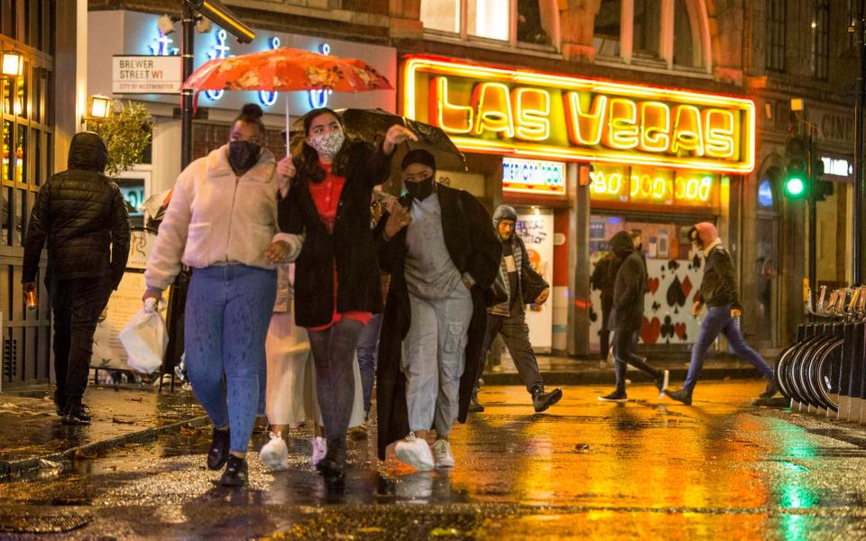 Despite the rainy weather and Tier 2 lockdown, revellers hit the streets of Soho in central London this weekend - Marcin Nowak/LNP