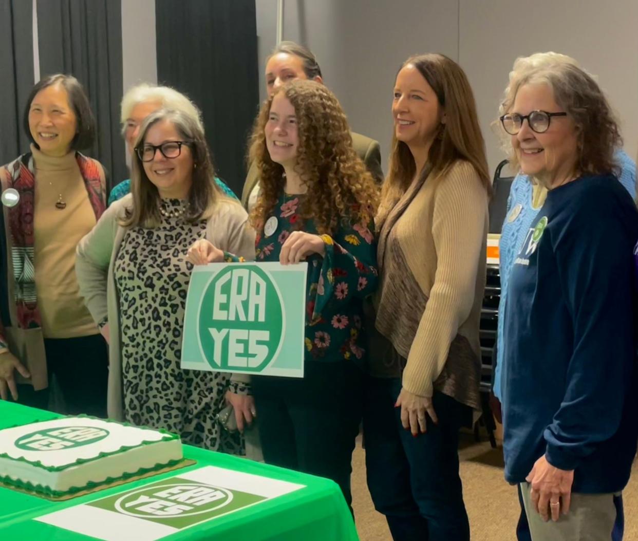 Irene Strohbeen, Mary Ann Rossi, Lori Palmeri, Lee Snodgrass, Megan Eisenstein, Julie Keller and Becky O'Connor pose for a photo at a Feb. 5 press conference for the introduction of a state Equal Rights Amendment.