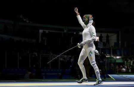 2016 Rio Olympics - Fencing - Quarterfinal - Women's Epee Individual Quarterfinals - Carioca Arena 3 - Rio de Janeiro, Brazil - 06/08/2016. Nathalie Moellhausen (BRA) of Brazil celebrates. REUTERS/Issei Kato