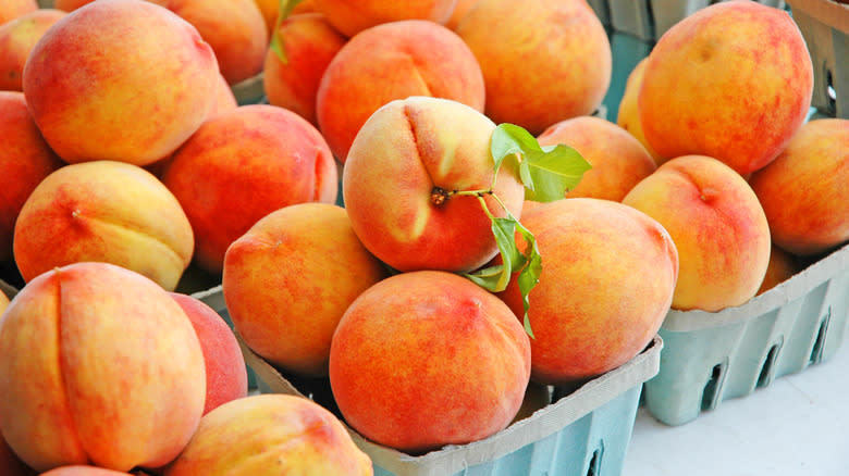 Baskets of fresh peaches