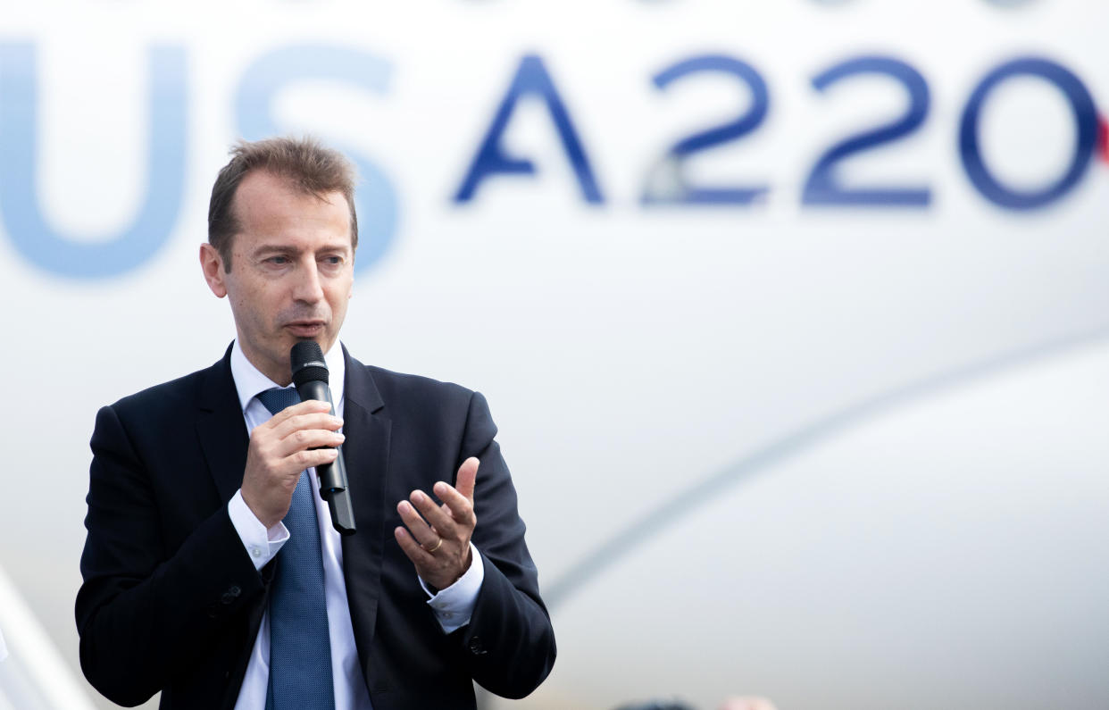 Guillaume Faury, chief executive officer of commercial aircraft at Airbus SE, delivers a speech following the unveiling of the new Airbus A220 single-aisle aircraft in Toulouse, France, on Tuesday, July 10, 2018. Photo: Christophe Morin/Bloomberg