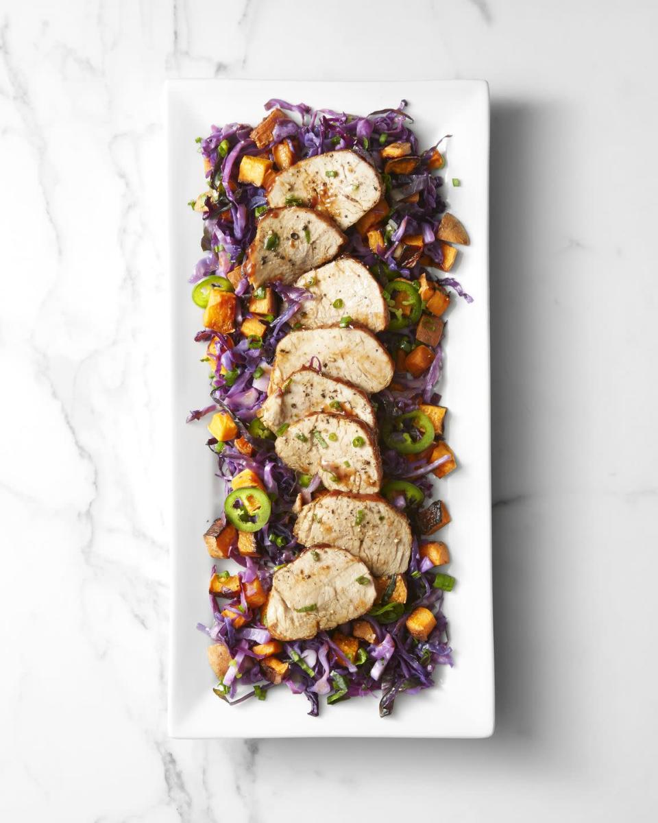 <p>Preparing lean pork tenderloin with spicy cabbage and roasted sweet potatoes dresses up the other white meat for an easy dinner that uses just two pans for the protein, starch, and vegetable elements. That means fewer squabbles over who has to do the dishes — a Merry Christmas if we ever saw one. </p><p><em><a href="https://www.goodhousekeeping.com/food-recipes/healthy/a42203/roast-pork-and-sweet-potatoes-with-spicy-cabbage-recipe/" rel="nofollow noopener" target="_blank" data-ylk="slk:Get the recipe for Roast Pork and Sweet Potatoes with Spicy Cabbage »" class="link rapid-noclick-resp">Get the recipe for Roast Pork and Sweet Potatoes with Spicy Cabbage »</a></em></p>