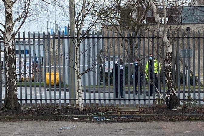 <p>Police officers at the Wrexham Industrial Estate</p> (@ian_hunter9)