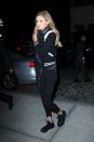 <p>Hadid continues to sport the athleisure trend, sporting a black bomber, hoodie, leggings and sneakers in NYC. </p>