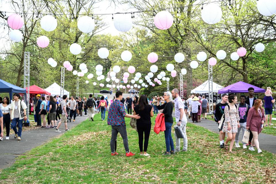 Fairgoers attend the Subaru Cherry Blossom Festival of Greater Philadelphia, an annual event in Philadelphia's Fairmount Park. This year's festival will have several entertainment activities the weekend of April 13-14.