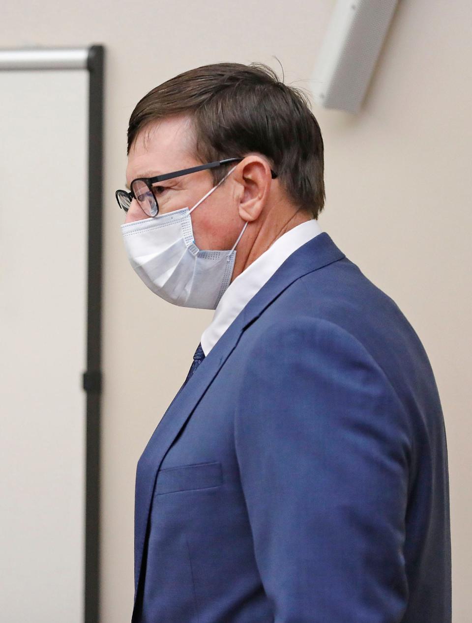 Former Cohasset teacher Jeffrey Knight listens during the first day of his sexual assault trial in Quincy District Court Monday, Nov. 15, 2021.