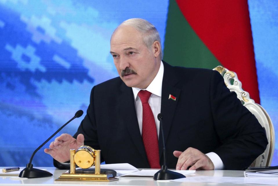 Belarus's President Alexander Lukashenko speaks during a briefing in Minsk, Belarus, Friday, Feb. 3, 2017. In a televised broadcast on Friday, Lukashenko asked the country's interior minister to press charges against Russia's top food safety official, alleging charges of "damaging the state" because Russia stopped the import of Belarusian products due to quality issues and suspicions that Belarus resells EU-made dairy products that are banned in Russia. The Kremlin responded to the outburst, listing the loans and reduced taxes that Russia gave to Belarus. (Maxim Guchek/BelTA Pool Photo via AP)