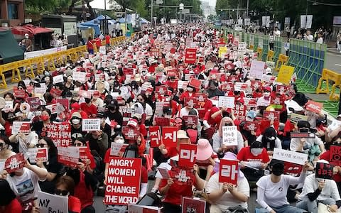 Thousands of South Korean women protested last year over digital sex crimes - Credit: Jung Hawon/AFP