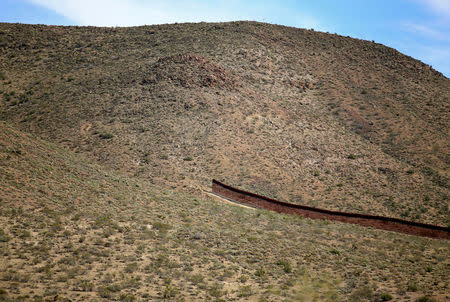 FILE PHOTO: A gap in the U.S.-Mexico border fence is seen outside Jacumba, California, United States, October 7, 2016. REUTERS/Mike Blake/File Photo