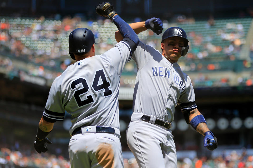 SAN FRANCISCO, CALIFORNIA - APRIL 28: Gleyber Torres #25 of the New York Yankees celebrates a home run with Gary Sanchez #24 during the third inning against the San Francisco Giants at Oracle Park on April 28, 2019 in San Francisco, California. (Photo by Daniel Shirey/Getty Images)