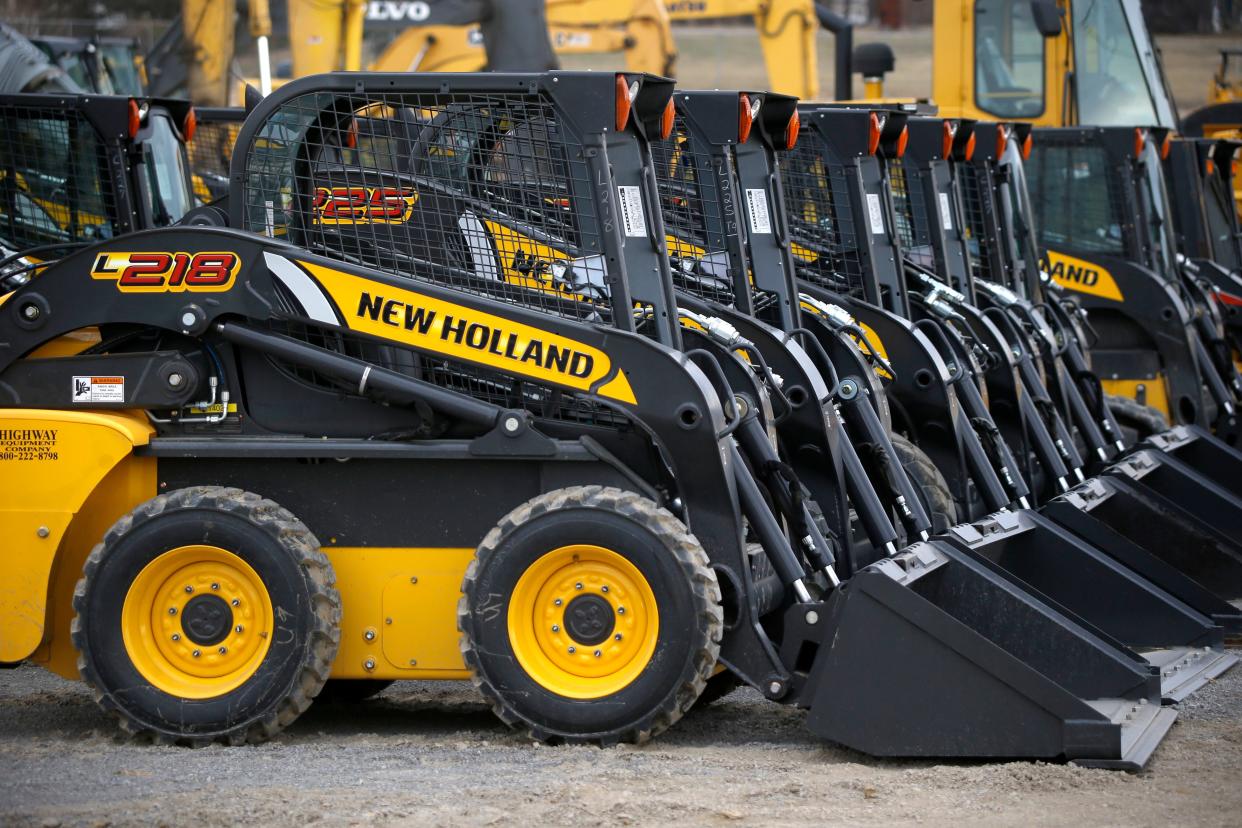 More than 1,000 CNH Industrial workers who have been on strike since last May have approved a new contract with the maker of tractors, bulldozers, backhoes and other heavy equipment. The United Auto Workers union said workers in Racine, Wisconsin, and Burlington, Iowa, approved the deal Saturday, Jan. 21, 2023 — two weeks after they rejected an earlier agreement.