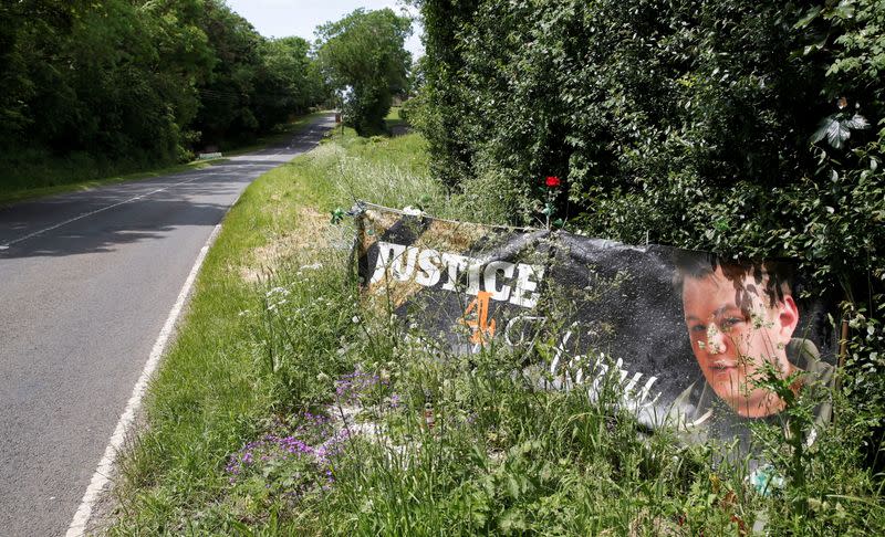 Banner and a memorial area for Harry Dunn