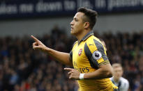 <p>Arsenal’s Alexis Sanchez celebrates scoring their first goal </p>