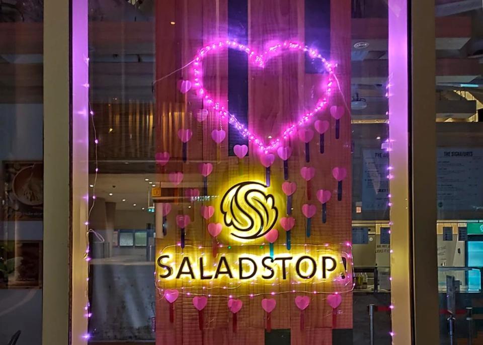 Pink lights and hearts in Salad Stop's storefront in support of Pink Dot 2021, Singapore's annual rally for LGBTQ equality. (Photo: Pink Dot)