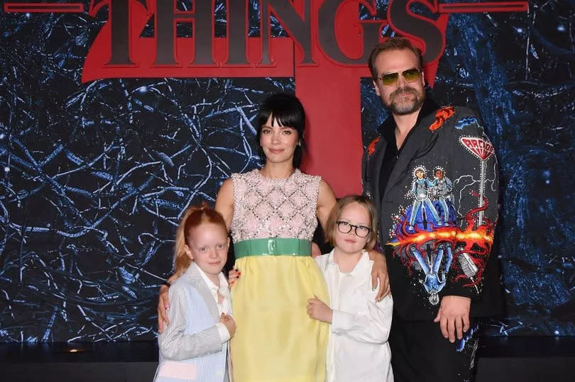 English singer Lily Allen (2nd L), daughters Marnie Rose Cooper (L) and Ethel Cooper (2nd R), and US actor David Harbour attend "Stranger Things" season 4 premiere at Netflix Brooklyn in New York City on May 14, 2022.